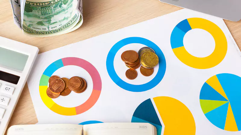 coins-on-pie-charts-representing-investment-strategy-and-passive-income-for-early-retirement