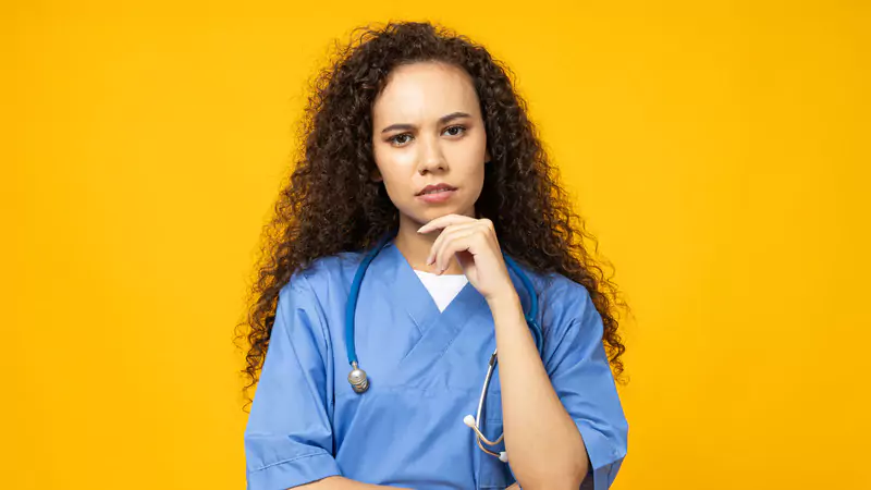nurse-in-scrubs-looking-suspicious-and-concerned-about-missing-hospital-supplies
