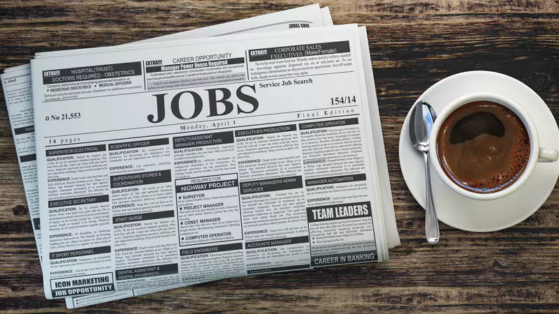 job-classifieds-newspaper-and-coffee-cup-symbolizing-nurses-considering-career-change