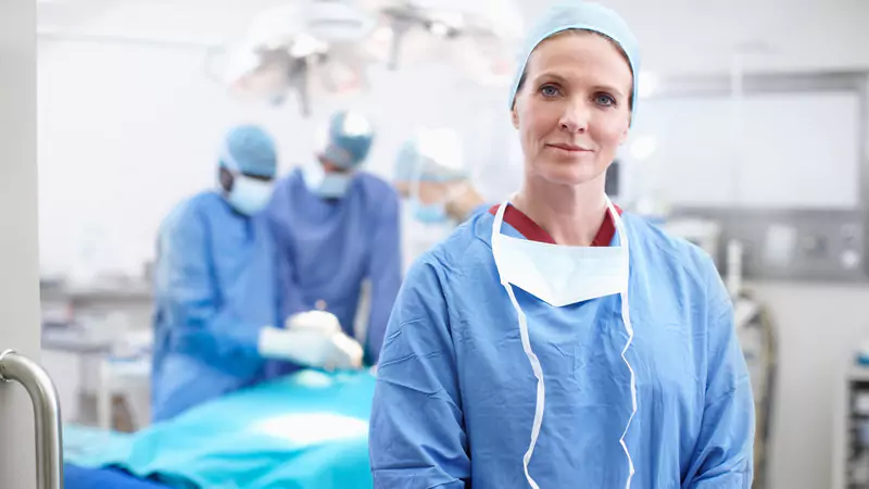 operating-room-nurse-in-surgical-scrubs-in-sterile-environment