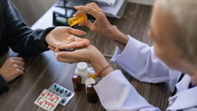 nurse-handing-patient-medication-during-consultation-demonstrating-importance-of-supply-availability