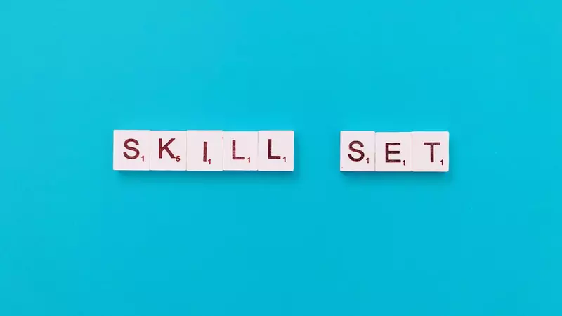 skill-set-text-on-blue-background-using-scrabble-tiles
